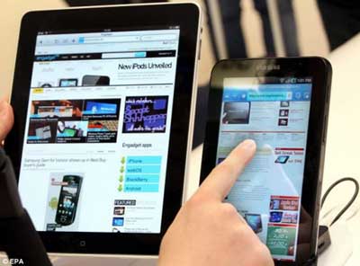 Ipad e Galaxy Tab, os dois principais tablets do mercado atual Ipad e Galaxy Tab, os dois principais tablets do mercado atual